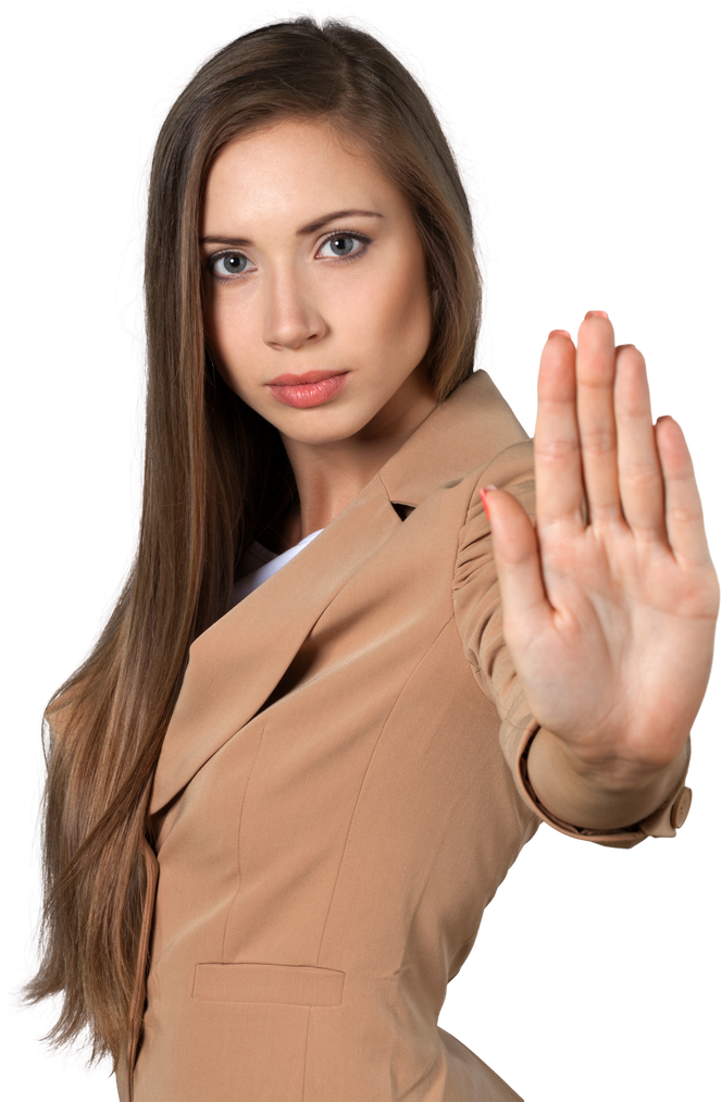 Woman Wearing an Office Attire Gesturing the Stop Sign