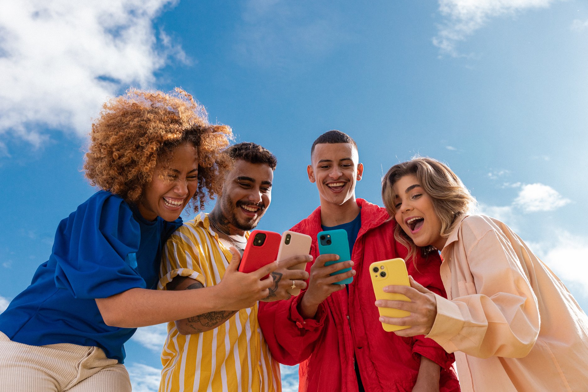 Outdoor Youths Portrait of Friends with Smartphones